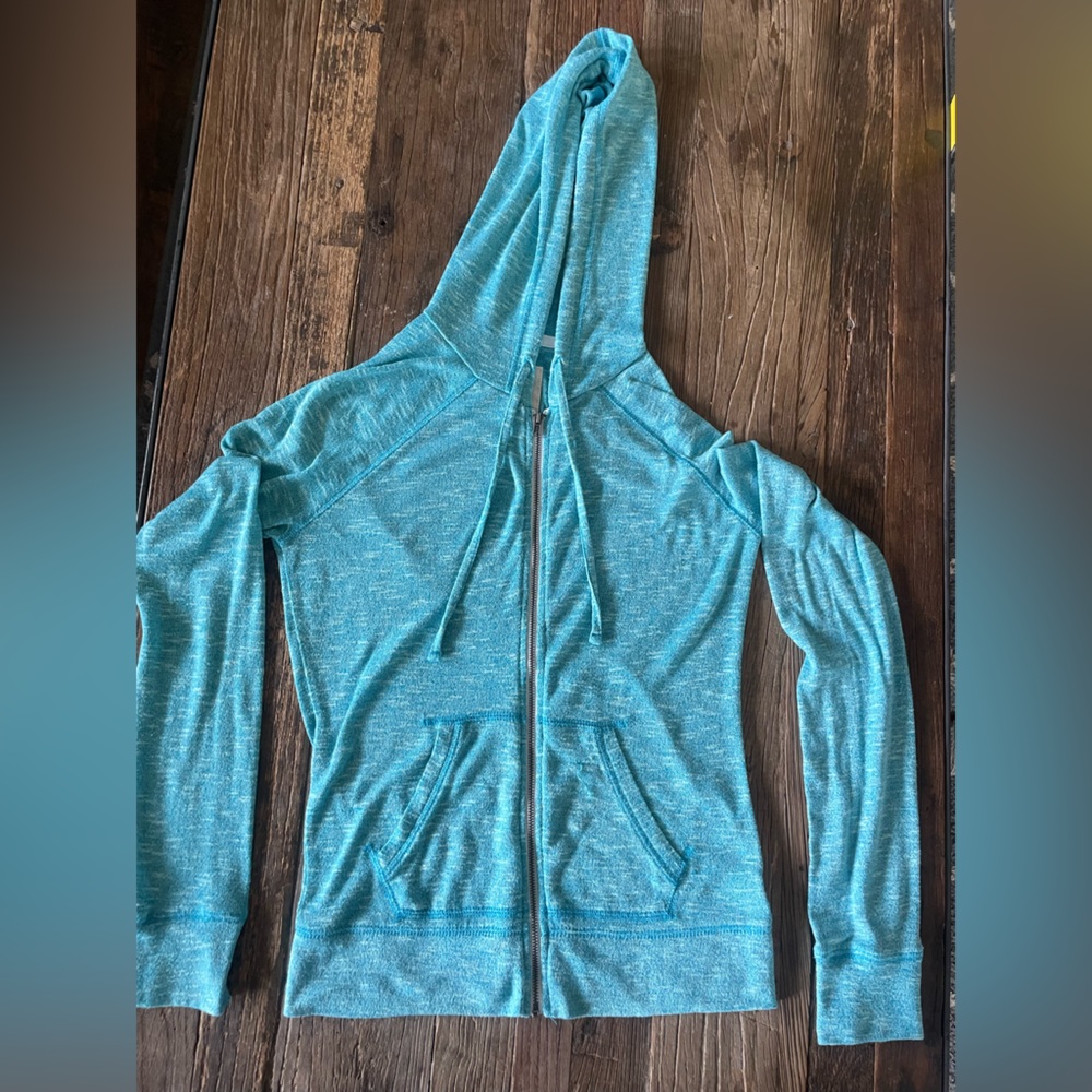 Mossimo light turquoise zip up seater size XS. Has some stretch.